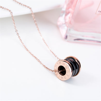 Black Ceramic and 18K Rose Gold-Plated Coil Pendant Necklace, rose gold pendant necklace for women, detail close-up
