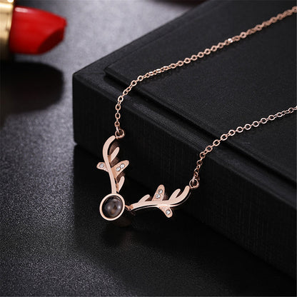 Cubic Zirconia and 18K Rose Gold-Plated Antler Pendant Necklace, rose gold pendant necklace for women, detail close-up