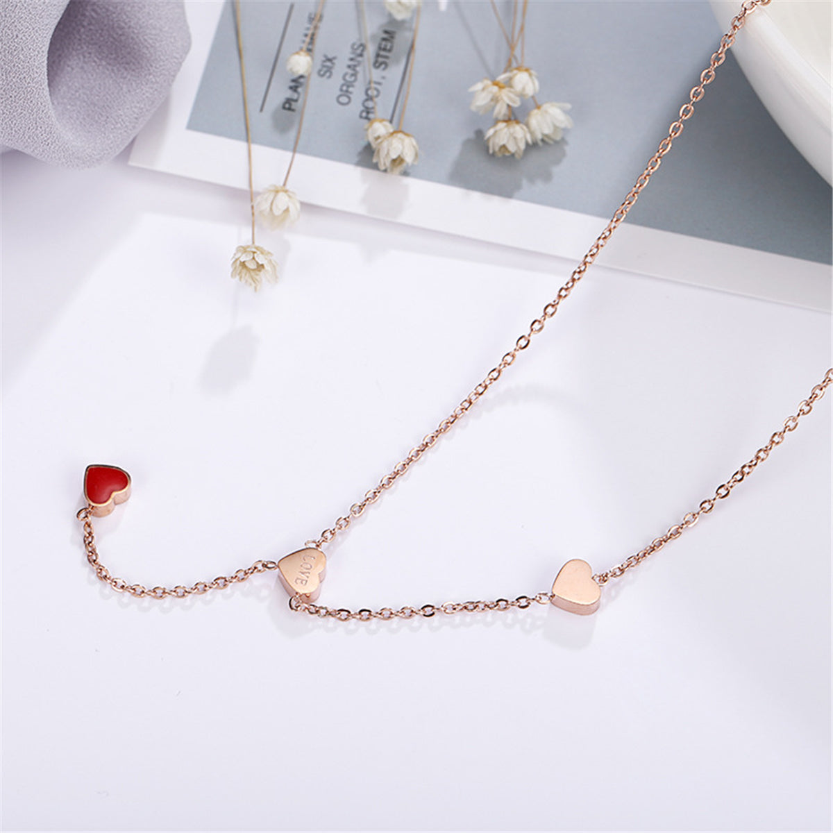 Red Enamel and 18K Rose Gold-Plated Heart Lariat Necklace, rose gold pendant necklace for women, detail close-up