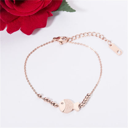 Cubic Zirconia and 18K Rose Gold-Plated Bead Chain Fish Charm Bracelet, rose gold bracelet for women, detail close-up