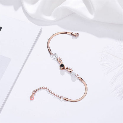 Crystal and 18K Rose Gold-Plated Antler Charm Bracelet, rose gold bracelet for women, everyday style, detail close-up