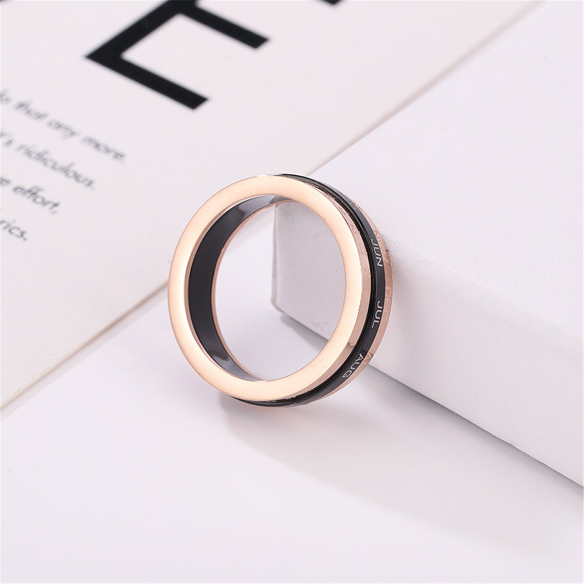 Black Acrylic and 18K Rose Gold-Plated Calendar Ring, rose gold statement rings for women, everyday style, detail close-up