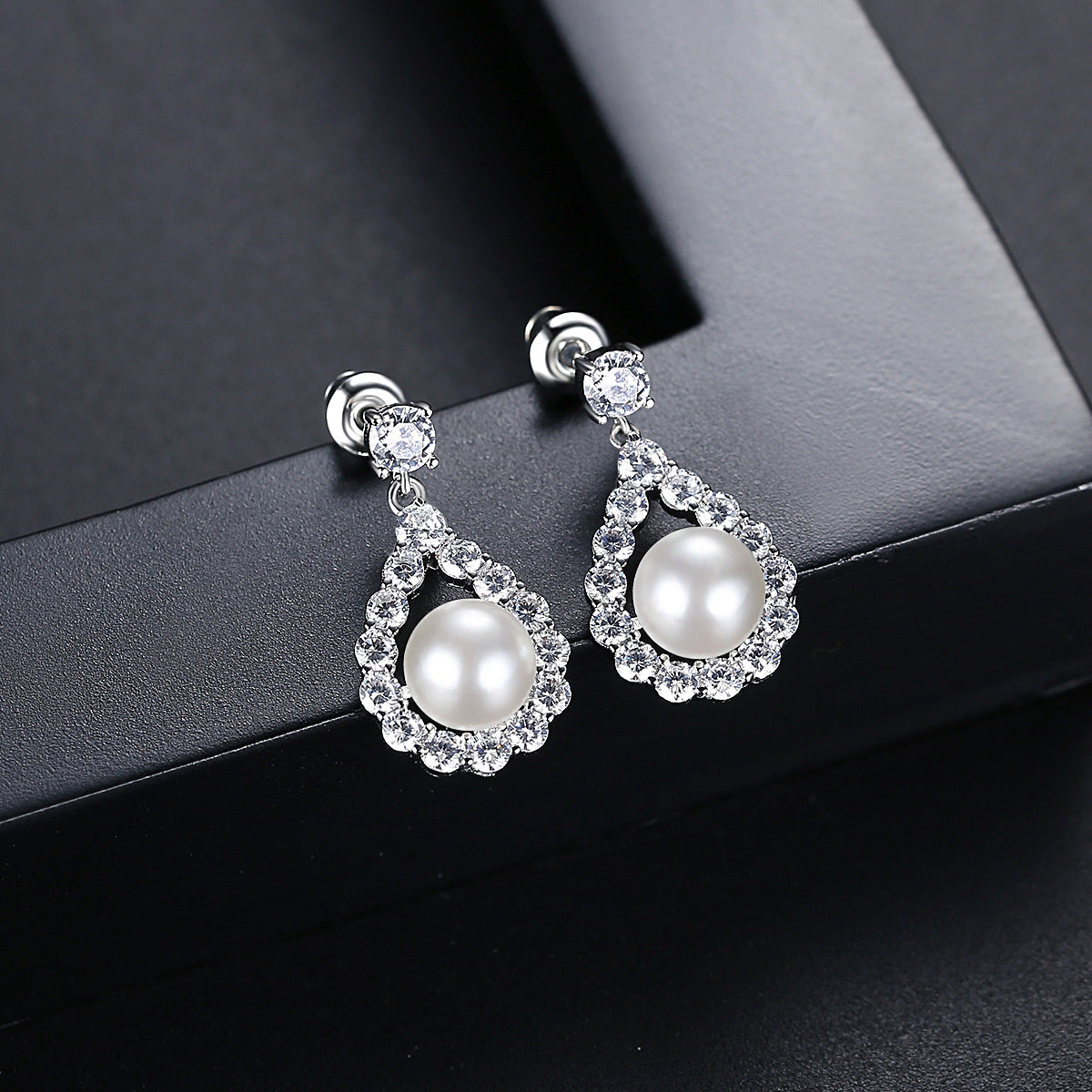Cubic Zirconia and Pearl Silver-Plated Teardrop Earrings, silver drop earrings for women, botanical inspired, detail close-up