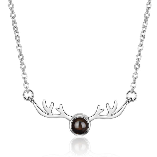 Black Crystal and Platinum Antlers Pendant Necklace, platinum pendant necklace for women, vintage-inspired design, front view