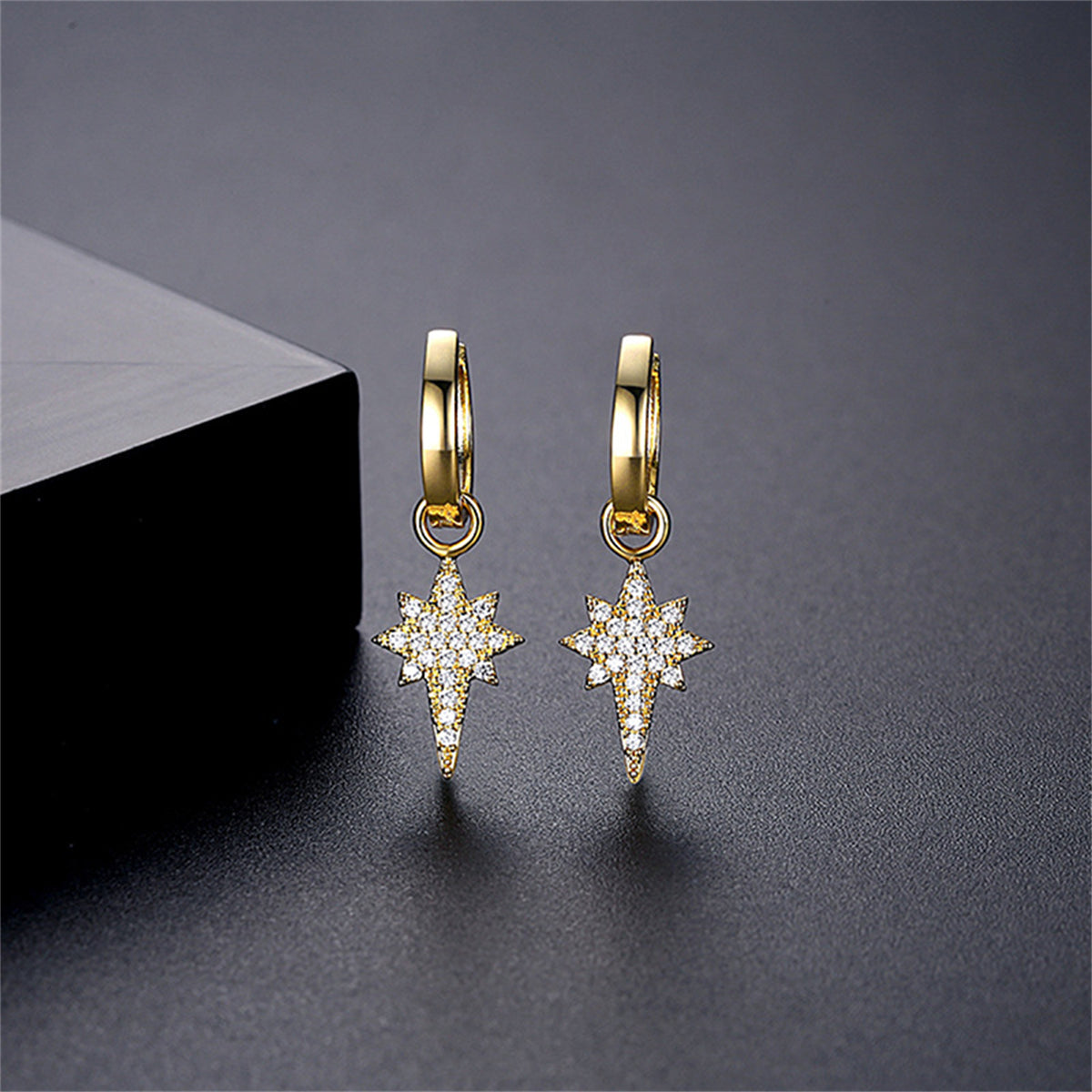 Cubic Zirconia and 18K Gold-Plated Star Huggie Earrings, gold huggie earrings, dainty minimalist design, front view