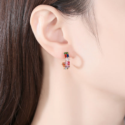 Multicolor Crystal and 18K Gold-Plated C-Shape Huggie Earrings, gold huggie earrings, botanical inspired, side view