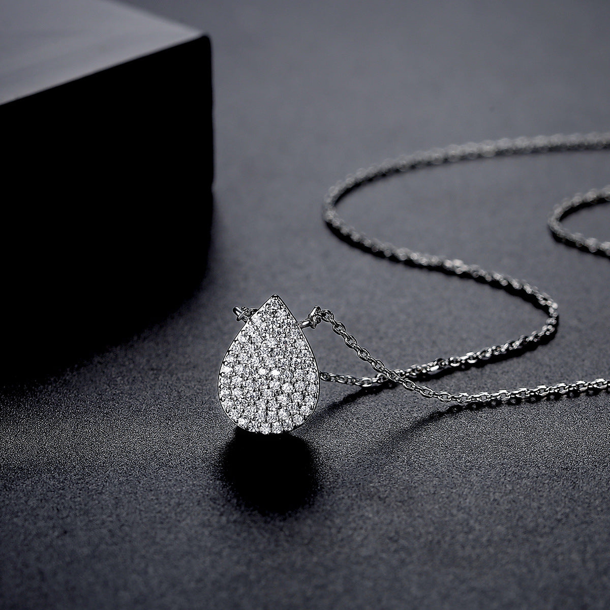Cubic Zirconia and Silver-Plated Drop Pendant Necklace, silver pendant necklace for women, vintage-inspired design, side view