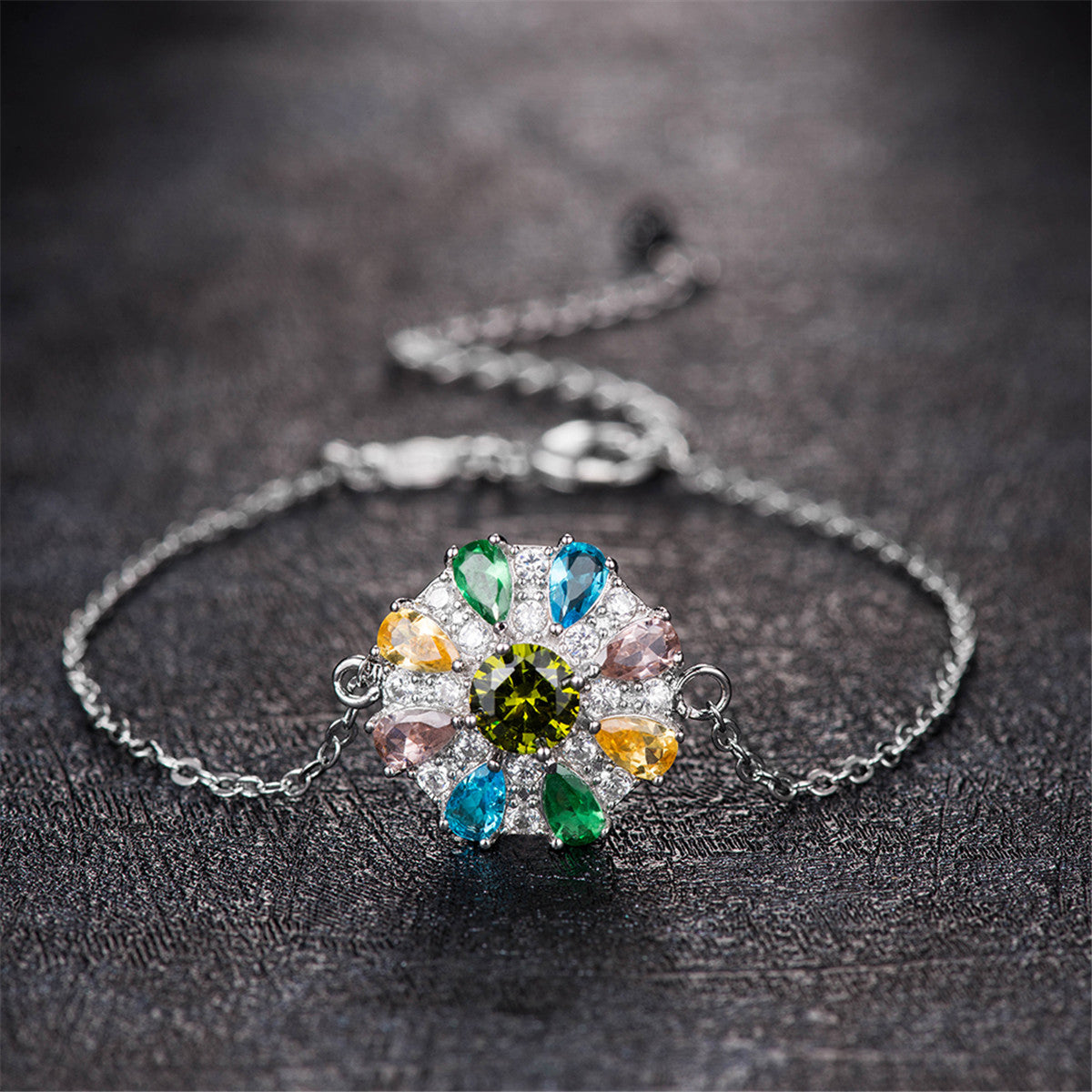 Blue Cubic Zirconia and Silver-Plated Flower Charm Bracelet, silver bracelet for women, detail close-up