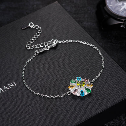Blue Cubic Zirconia and Silver-Plated Flower Charm Bracelet, silver bracelet for women, lifestyle look