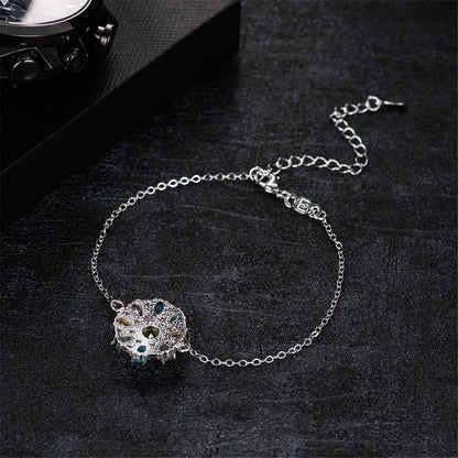 Blue Cubic Zirconia and Silver-Plated Flower Charm Bracelet, silver bracelet for women, dainty minimalist design, styled look