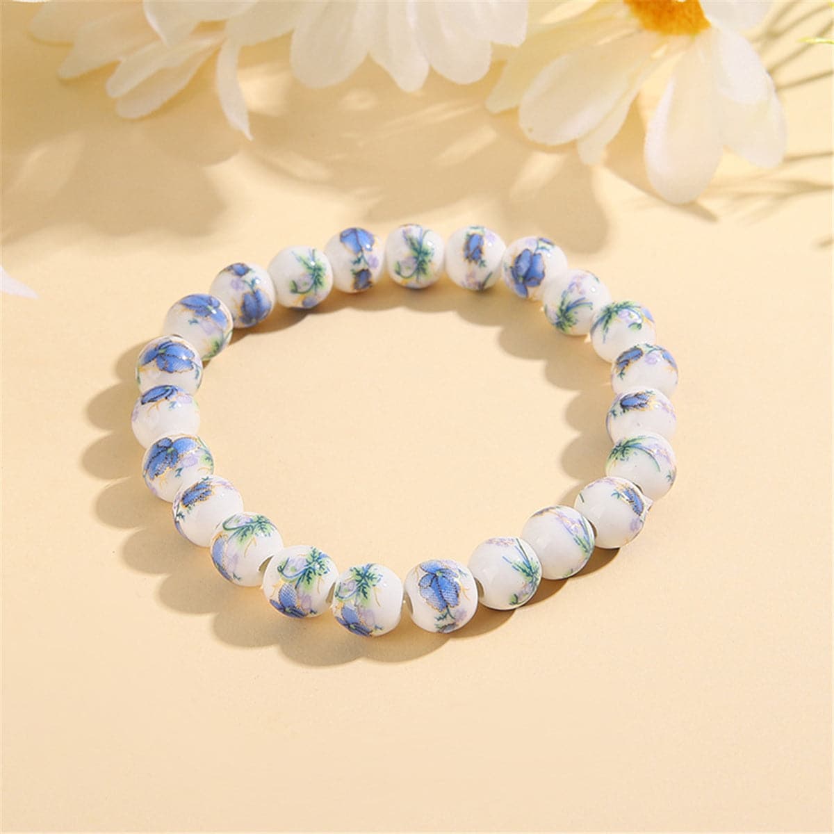 Light Blue and White Plum Blossom Stretch Beaded Bracelet, bracelet for women, botanical inspired, front view