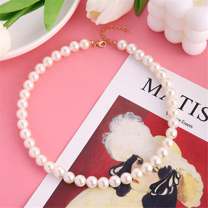 Pearl and 18K Gold-Plated 10MM Choker Necklace, gold pendant necklace for women, vintage-inspired design, lifestyle look