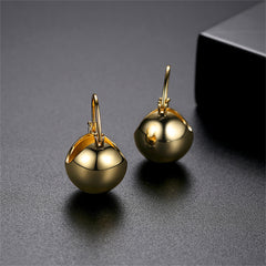 Stunning 18K gold-plated ball huggie earrings that elevate your style with their chic and timeless design.