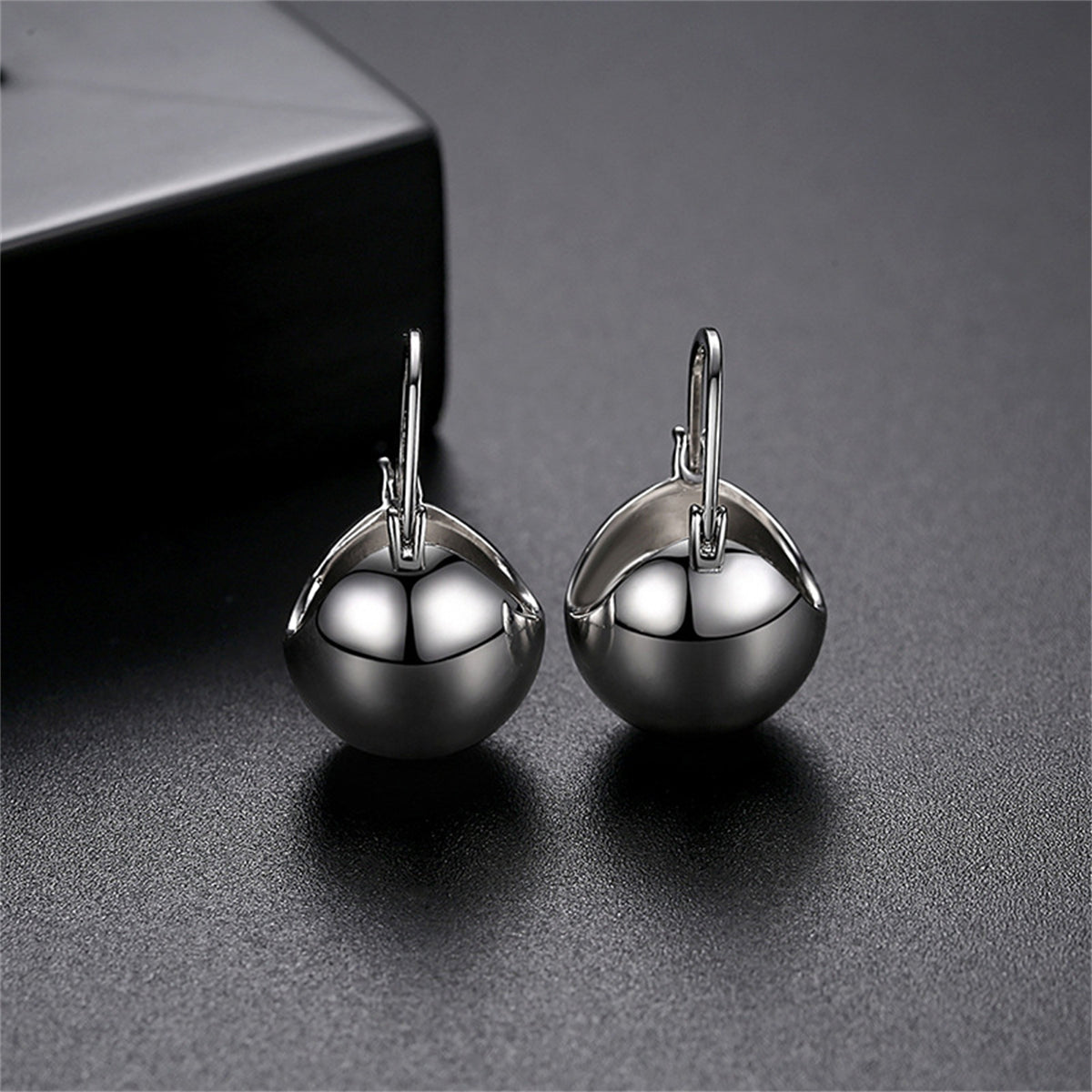 Silver-Plated Ball Huggie Earrings, silver huggie earrings, dainty minimalist design, front view