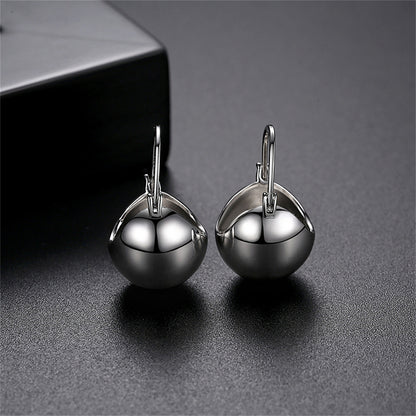 Silver-Plated Ball Huggie Earrings, silver huggie earrings, dainty minimalist design, front view