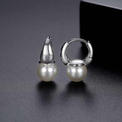 Pearl and Silver-Plated Huggie Earrings, silver huggie earrings, vintage-inspired design, detail close-up
