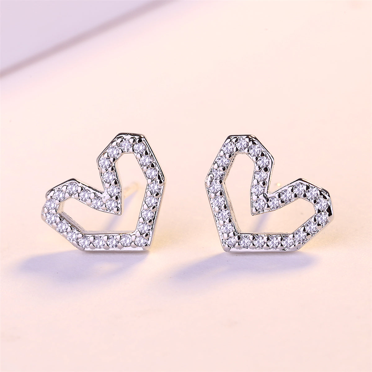 Cubic Zirconia and Silver-Plated Hexagon Heart Stud Earrings, silver stud earrings for women, botanical inspired, side view