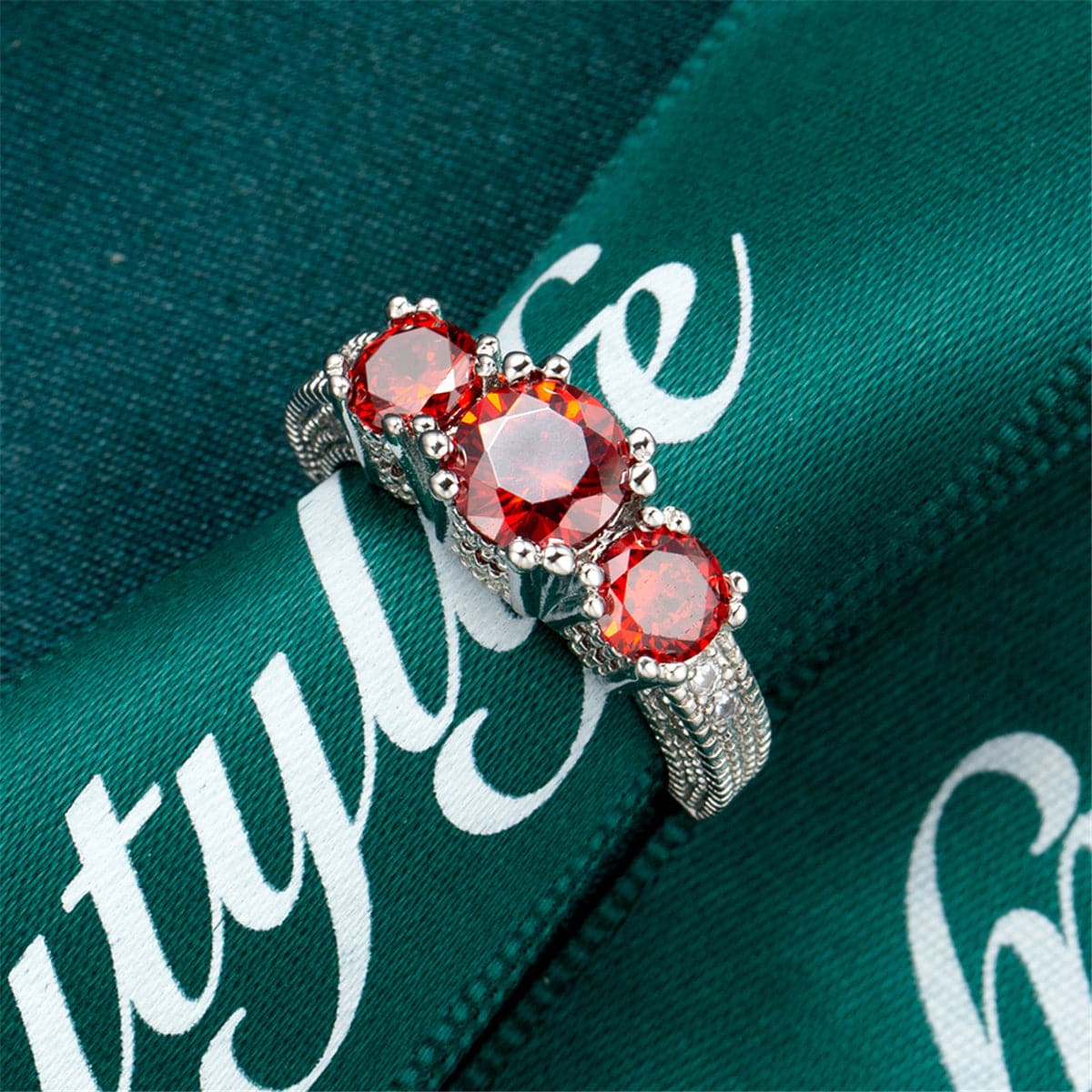Red Crystal and Silver-Plated Three-Stone Ring, silver statement rings for women, everyday style, detail close-up