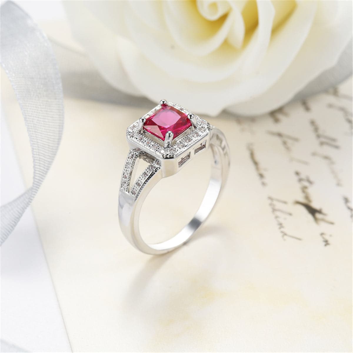 Red Cubic Zirconia and Crystal Halo Cushion-Cut Ring, statement rings for women, dainty minimalist design, detail close-up