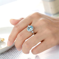 Sea Blue Cubic Zirconia & Crystal Halo Oval Ring