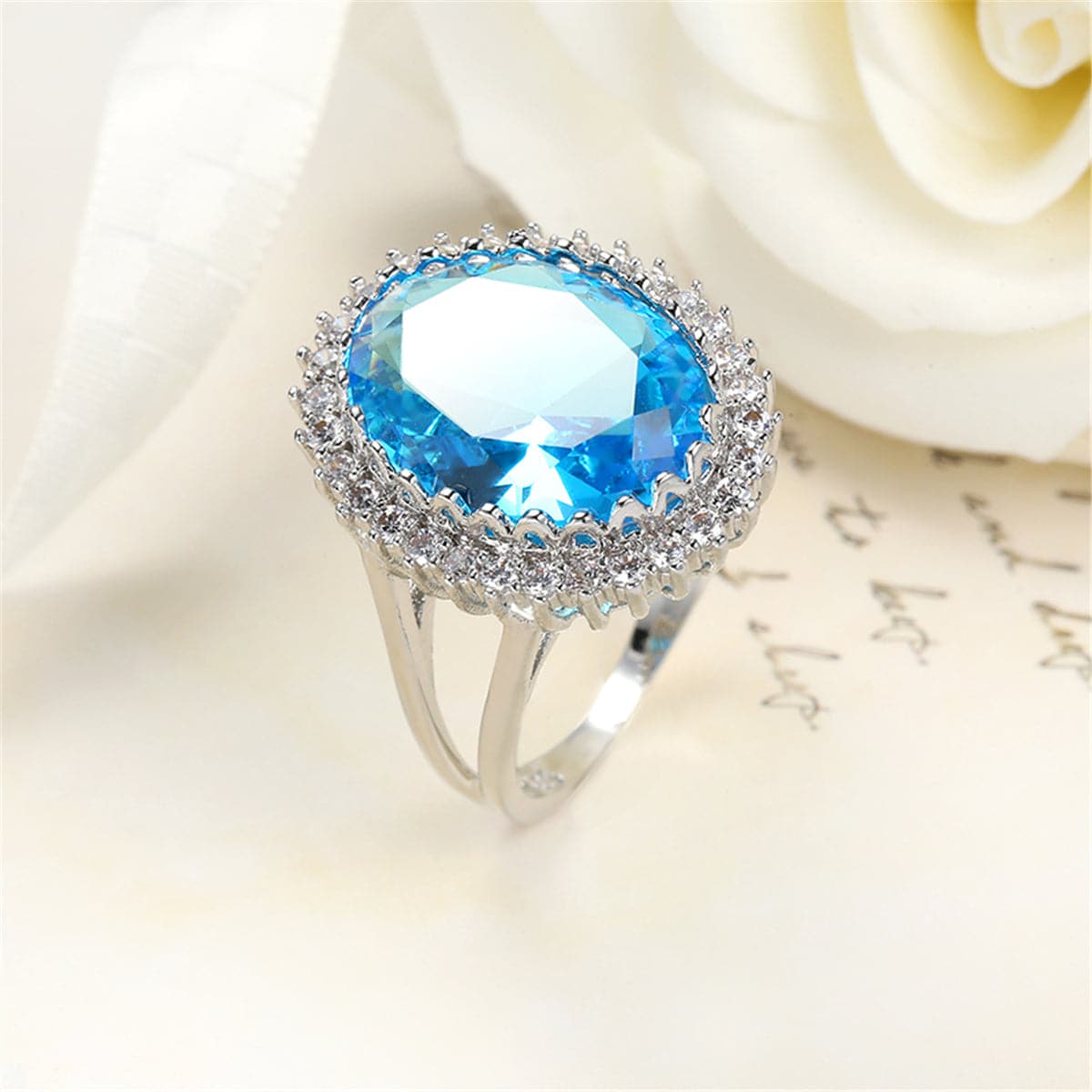 Sea Blue Crystal and Cubic Zirconia Oval-Cut Ring, statement rings for women, botanical inspired, front view