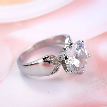 Crystal and Silver-Plated Round-Cut Cocktail Ring, silver statement rings for women, everyday style, detail close-up
