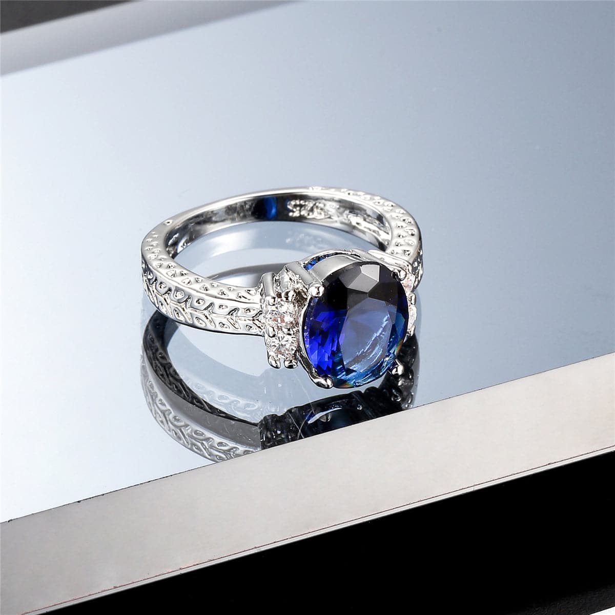 Navy Crystal and Cubic Zirconia Oval-Cut Flush-Band Ring, statement rings for women, botanical inspired, side view