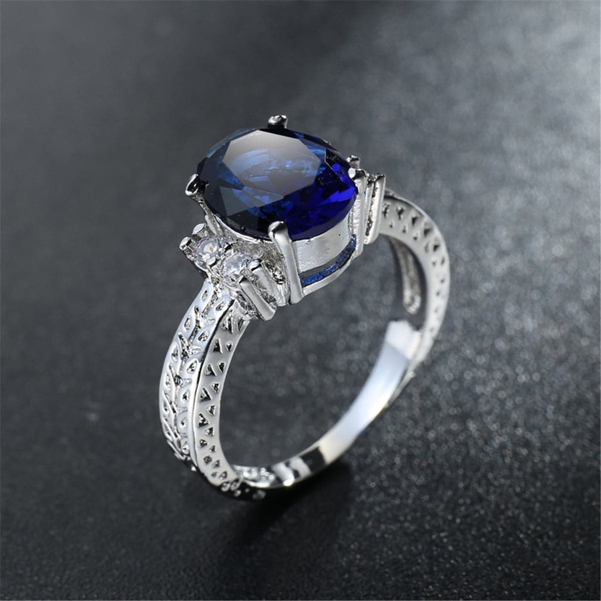 Navy Crystal and Cubic Zirconia Oval-Cut Flush-Band Ring, statement rings for women, botanical inspired, lifestyle look