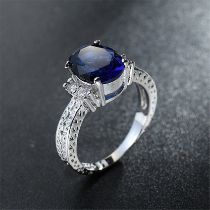 Navy Crystal and Cubic Zirconia Oval-Cut Flush-Band Ring, statement rings for women, botanical inspired, lifestyle look