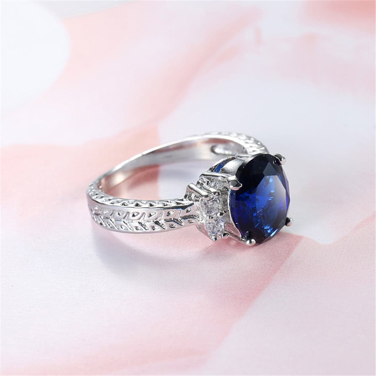 Navy Crystal and Cubic Zirconia Oval-Cut Flush-Band Ring, statement rings for women, botanical inspired, styled look
