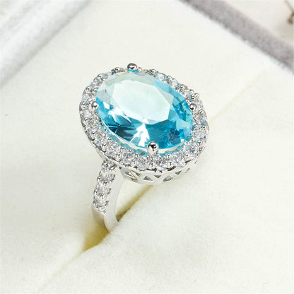Sea Blue Crystal and Cubic Zirconia Oval-Cut Halo Ring, statement rings for women, elegant gift for her, detail close-up