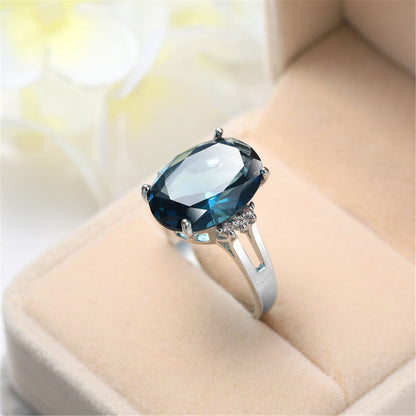 Navy Crystal and Silver-Plated Oval-Cut Cocktail Ring, silver statement rings for women, botanical inspired, side view