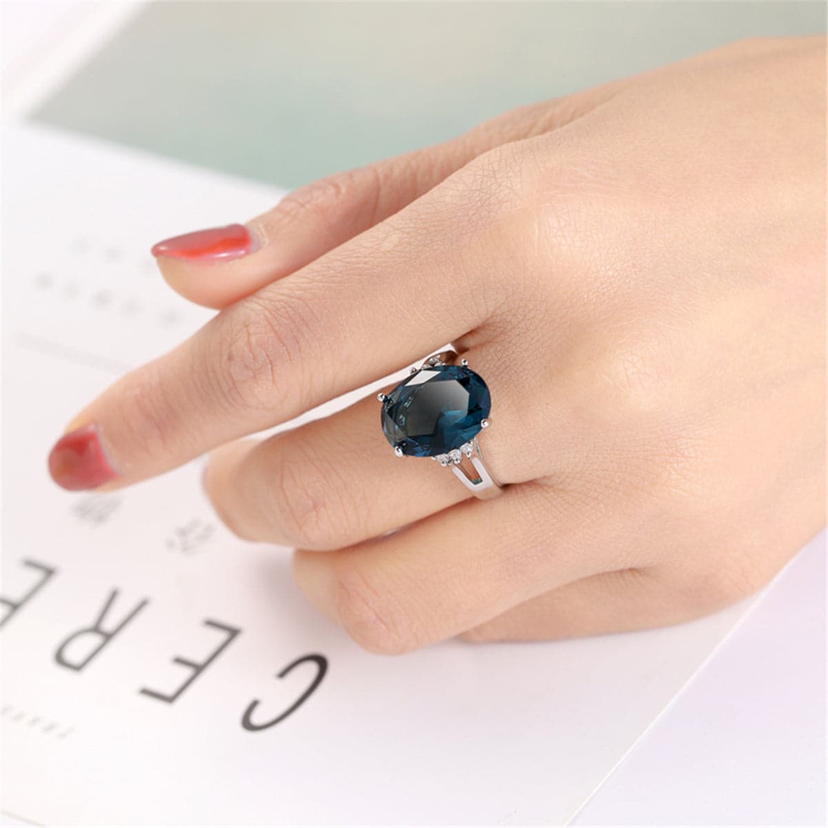 Navy Crystal and Silver-Plated Oval-Cut Cocktail Ring, silver statement rings for women, botanical inspired, lifestyle look