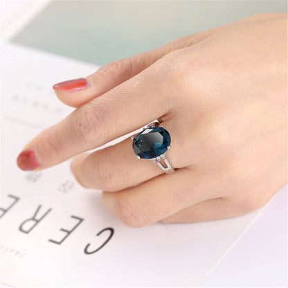 Navy Crystal and Silver-Plated Oval-Cut Cocktail Ring, silver statement rings for women, botanical inspired, lifestyle look