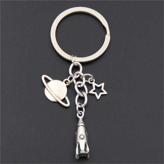 Silver-Plated Rocket Key Chain, silver pendant necklace for women, botanical inspired, front view