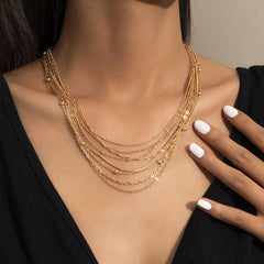 Elegant 18K gold-plated bead chain necklace set featuring multiple strands for a stunning layered look.