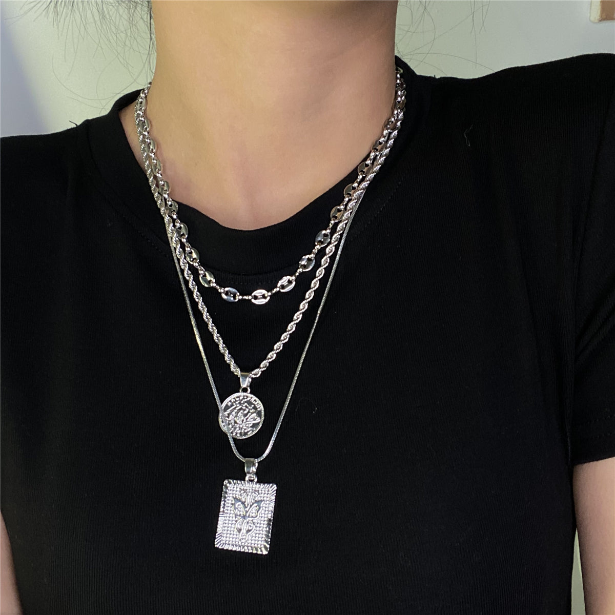 Silver-Plated Coin and Butterfly Layered Pendant Necklace, jewelry gift sets for women, botanical inspired, side view