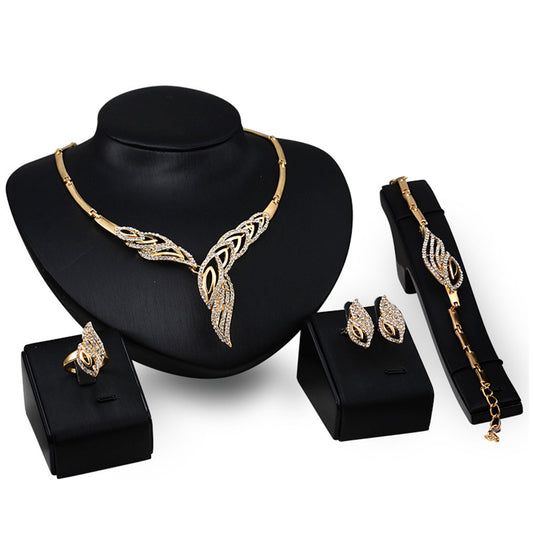 Cubic Zirconia and 18K Gold-Plated Bypass Wing Necklace Set, gold stud earrings for women, everyday style, front view