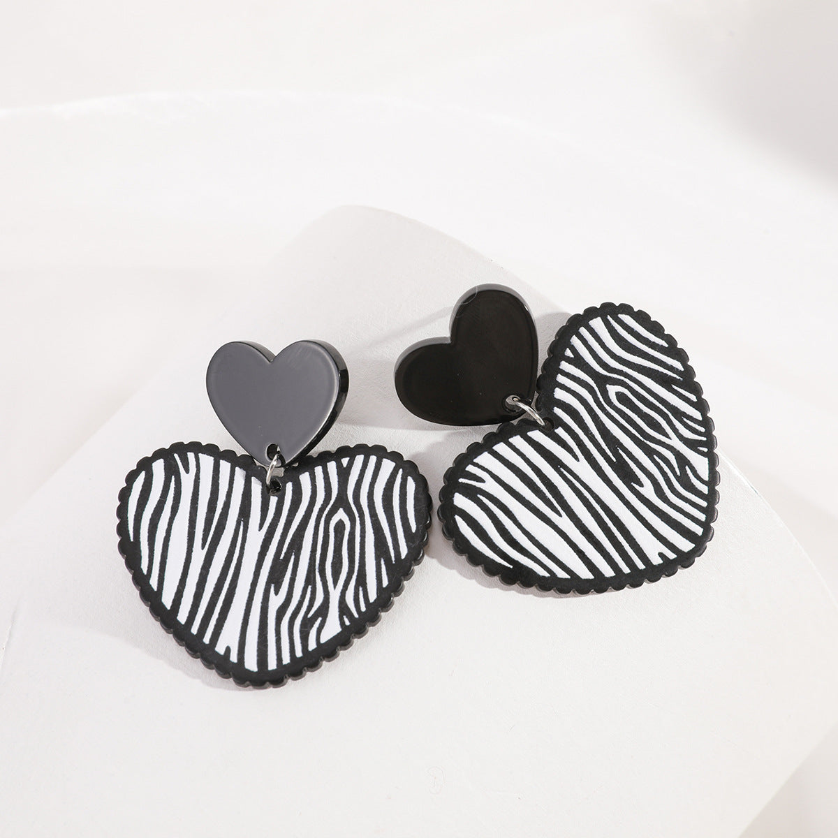 Black Acrylic and Silver-Plated Zebra Stripe Heart Drop Earrings, silver drop earrings for women, everyday style, front view