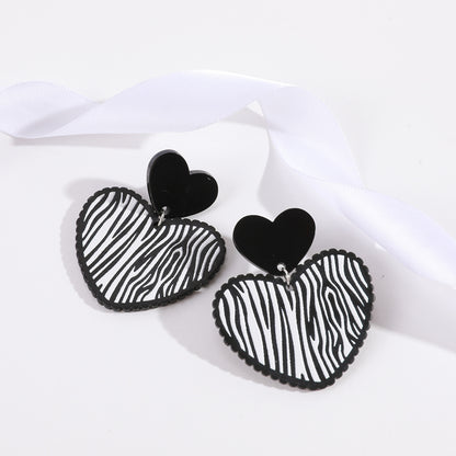 Black Acrylic and Silver-Plated Zebra Stripe Heart Drop Earrings, silver drop earrings for women, everyday style, side view
