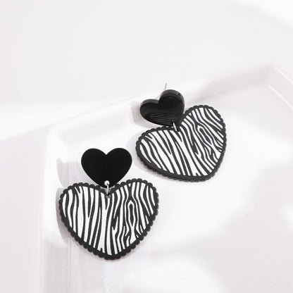 Black Acrylic and Silver-Plated Zebra Stripe Heart Drop Earrings, silver drop earrings for women, detail close-up