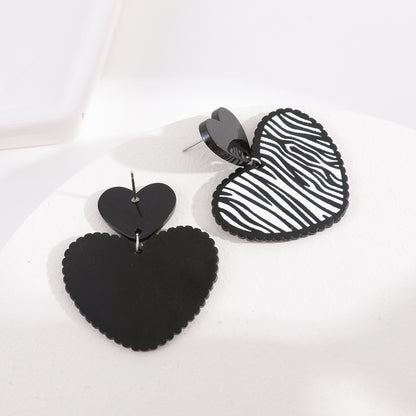 Black Acrylic and Silver-Plated Zebra Stripe Heart Drop Earrings, silver drop earrings for women, lifestyle look