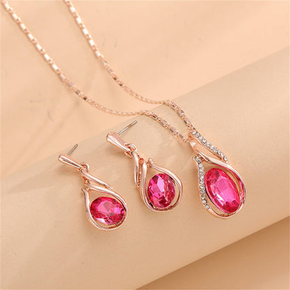 Red Crystal and Cubic Zirconia Pendant Necklace and Earrings, drop earrings for women, vintage-inspired design, front view