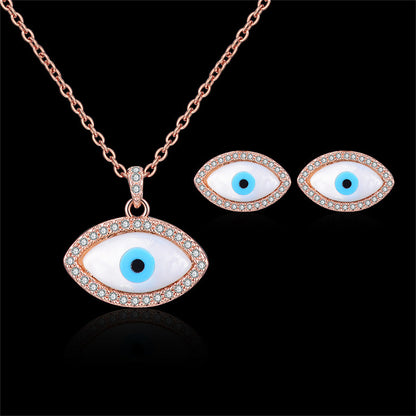 Cubic Zirconia and 18K Rose Gold-Plated Evil Eye Stud Earrings and Pendant Necklace, rose gold stud..., detail close-up