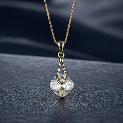 Crystal and 18K Gold-Plated Drop Earrings and Pendant Necklace, gold drop earrings for women, everyday style, detail close-up
