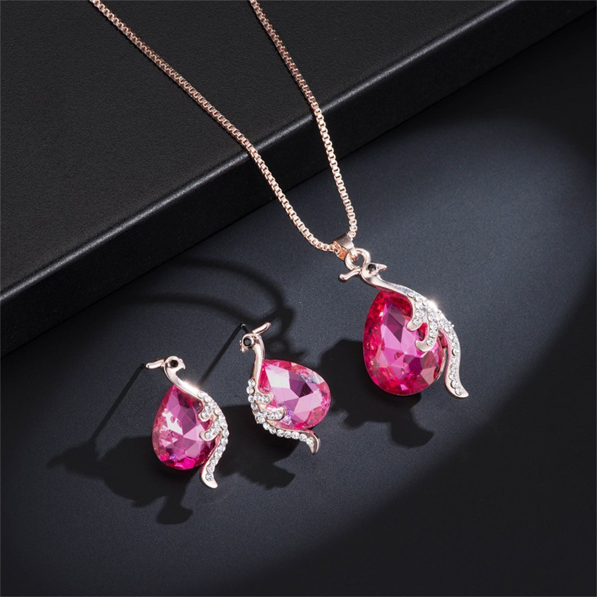 Red Crystal and Cubic Zirconia Peacock Pendant Necklace and Earrings, stud earrings for women, side view