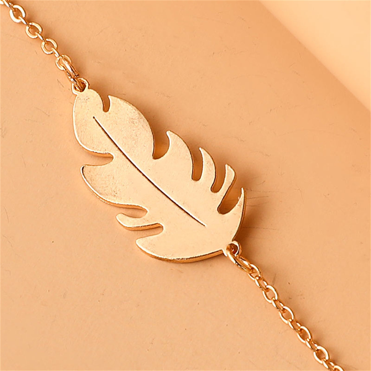 18K Gold-Plated Leaf Charm Bracelet, gold bracelet for women, vintage-inspired design, lifestyle look