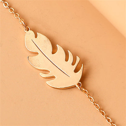 18K Gold-Plated Leaf Charm Bracelet, gold bracelet for women, vintage-inspired design, lifestyle look