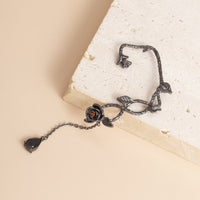 Black Crystal & Rhodium-Plated Copper Rose Drop Ear Cuffs
