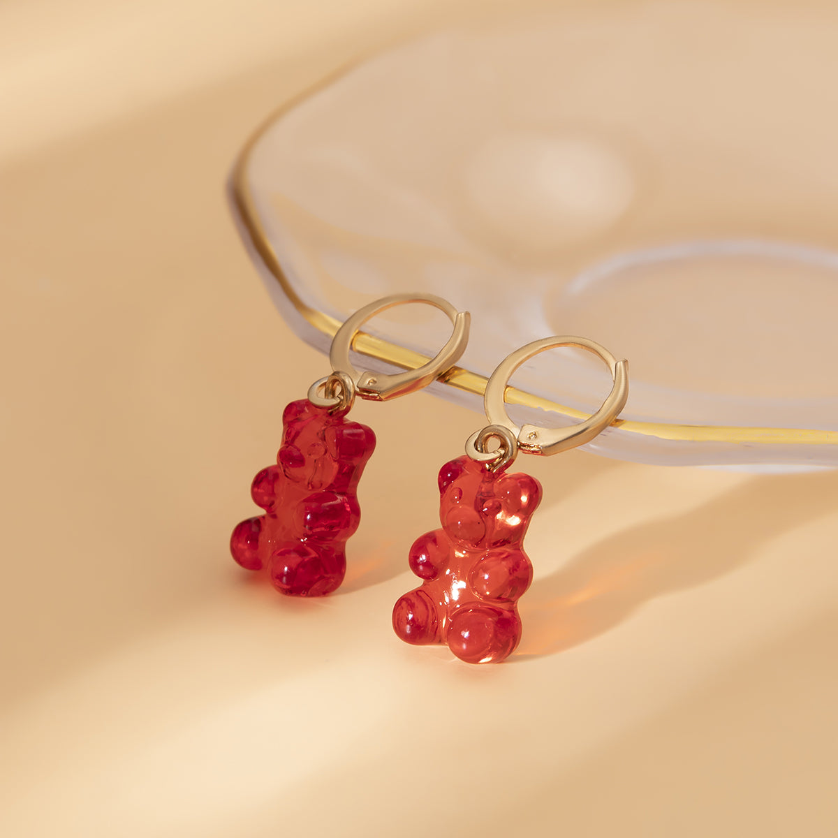 Red Resin and 18K Gold-Plated Bear Huggie Drop Earrings, gold huggie earrings, vintage-inspired design, detail close-up
